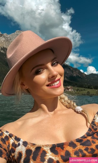 Peyton Kinsly @peyton.kinsly OnlyFans blonde big tits sexy only fans model wearing textured shirts and a hat on a boat