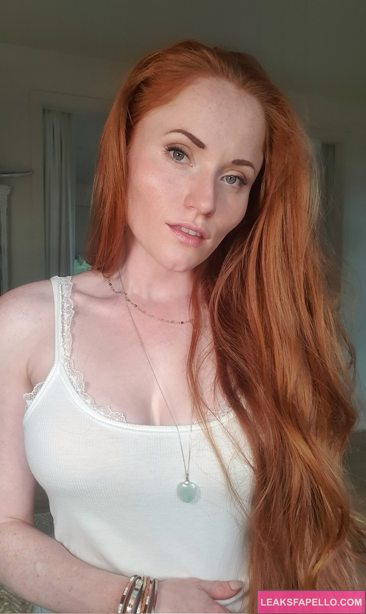 LoveAmyPond @loveamypond OnlyFans big tits redhead big tits thick ass hot sexy only fans model wearing white sexy top 