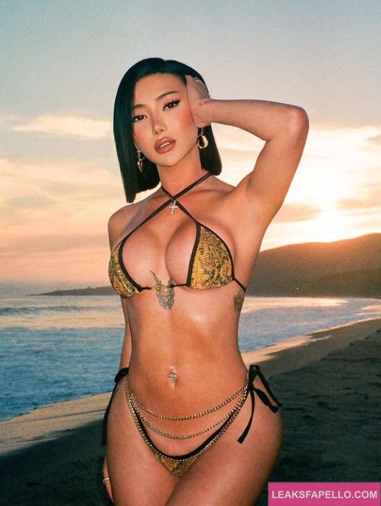 Nikita Nguyen wearing sexy bikini by beach side in sunset