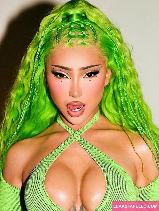 Nikita Nguyen stuns in green outfit and hair