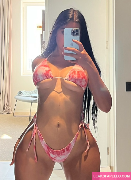 Jailyne Ojeda wearing red bikini and taking mirror selfie