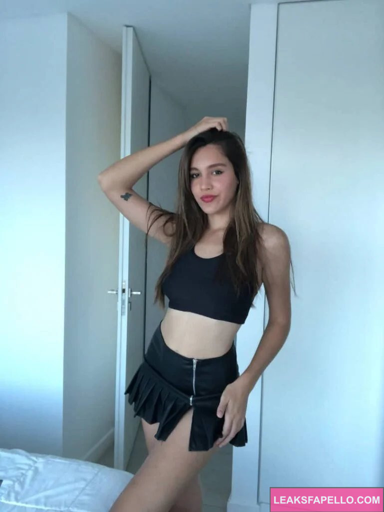 Clara Blanc @clarablanc OnlyFans big tits sexy onlyfans model wearing bblack skirt and top in the bedroom super hot