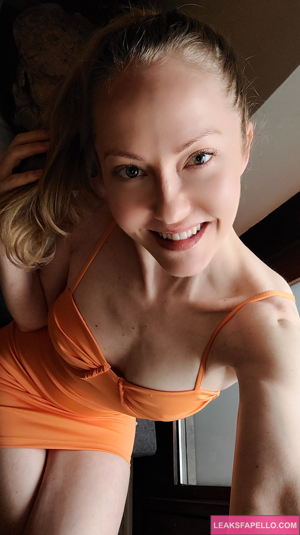 Sicilia @siciliamodel OnlyFans blonde sexy only fans model wearing orange sexy dress taking a selfie