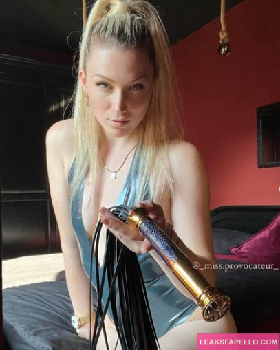 Miss Provocateur @miss.provocateur OnlyFans blonde sexy only fans model wearing sexy lingerie holding a whip