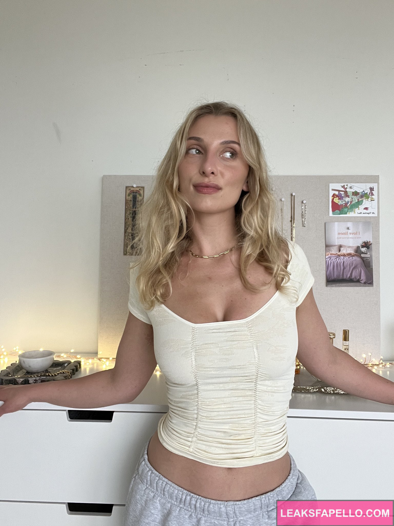 Josefine Silver @josefinesilver OnlyFans big tits blonde sexy hot only fans model wearing white shirt and grey pants