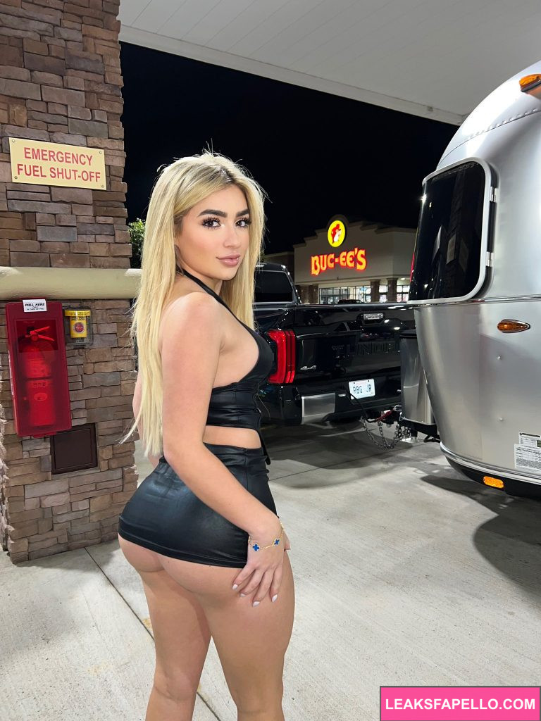 Faith Lianne @faithlianne OnlyFans blond thick ass hot onlyfans model wearing black mini skirt and tops