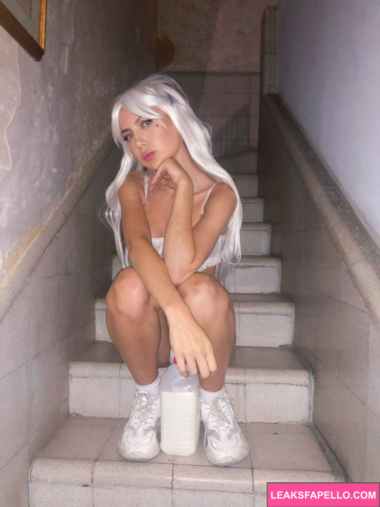 Luna London @thelunalondon OnlyFans hot blonde big tits sexy model wearing white sitting on the staircase