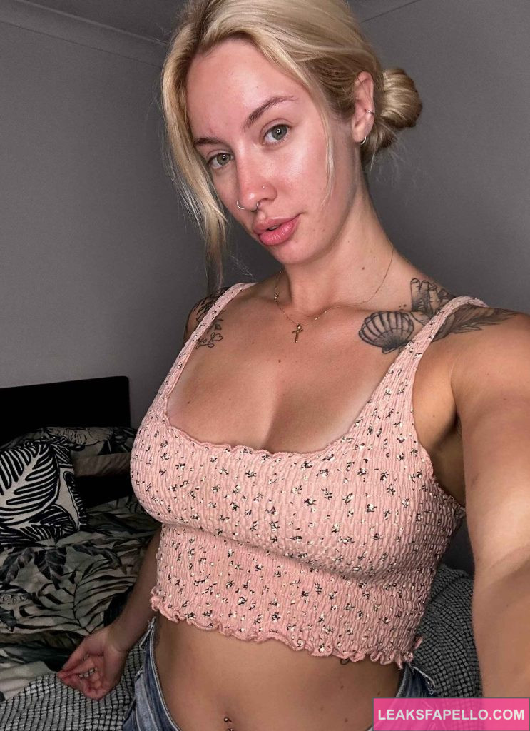 Maddison James @maddyjames99 OnlyFans blonde big tits tattoed hot only fans model wearing pink top selfie