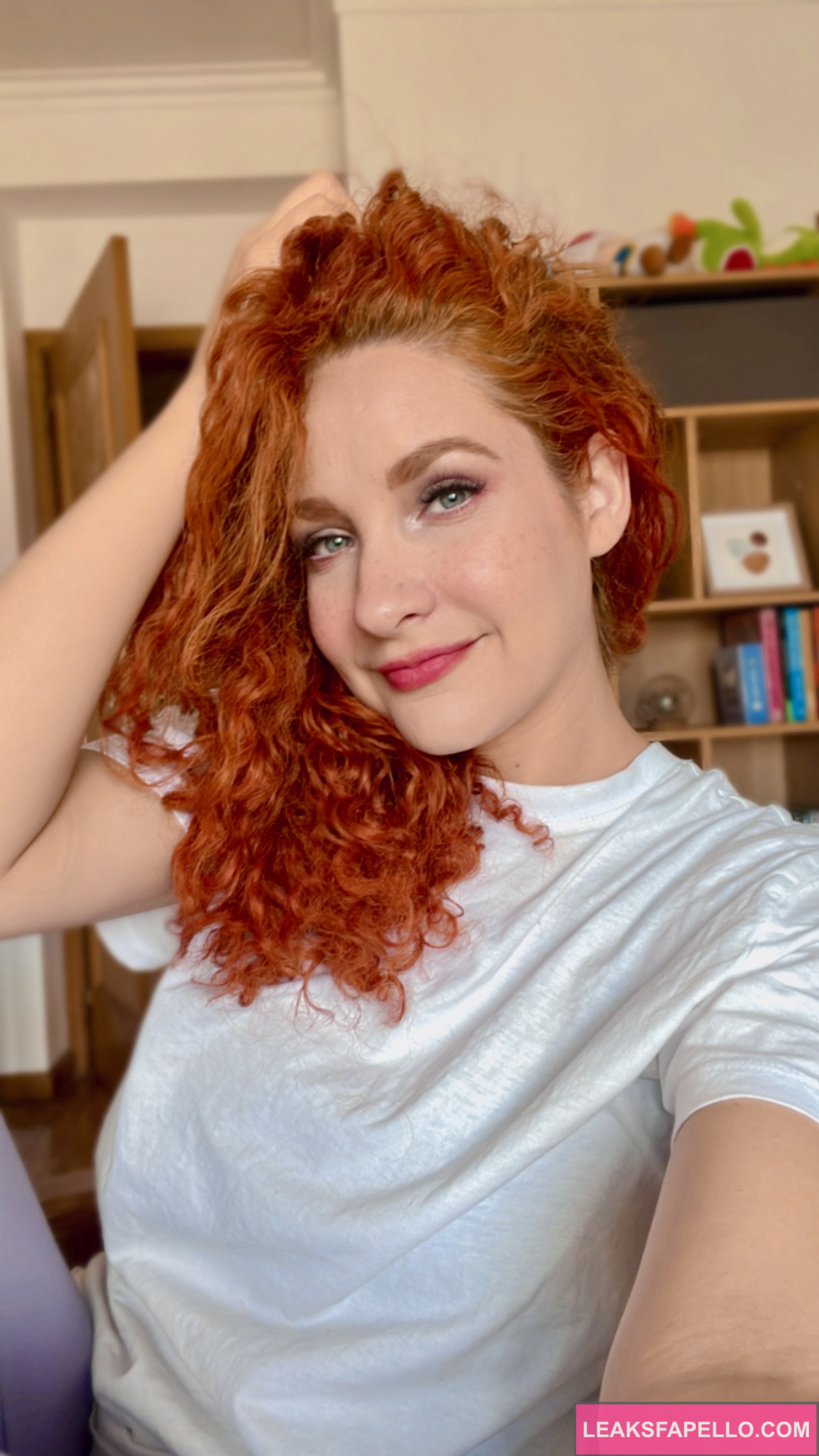 Ashley Ve @ashleyve OnlyFans curly red head only fans model wearing white shirt 