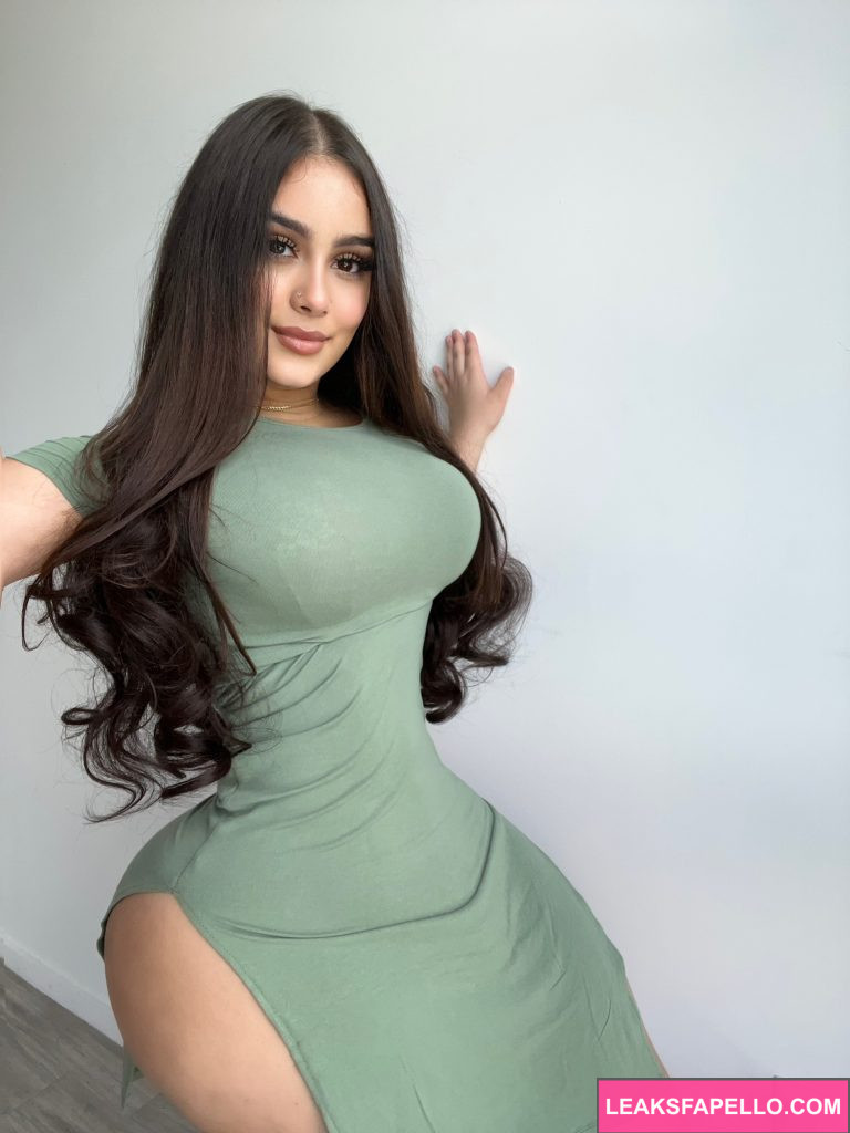 Annabella Ivy @annabelladoe OnlyFans chubby big boobs big ass only fans model wearing a green dress