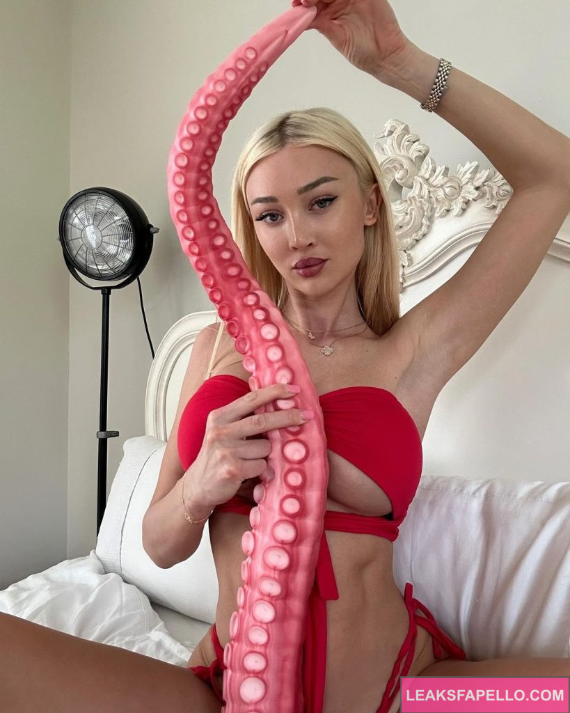 Frances Bentley @francesbentley OnlyFans blonde hot big tits sexy only fans model wearing red sexy lingerie and an octopus tentacle