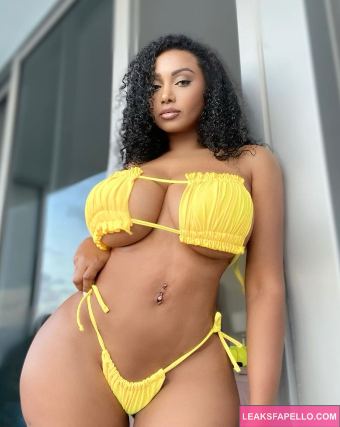 British Olivia @britisholivia OnlyFans big tits thick ass only fans model wearing yellow two piece bikini