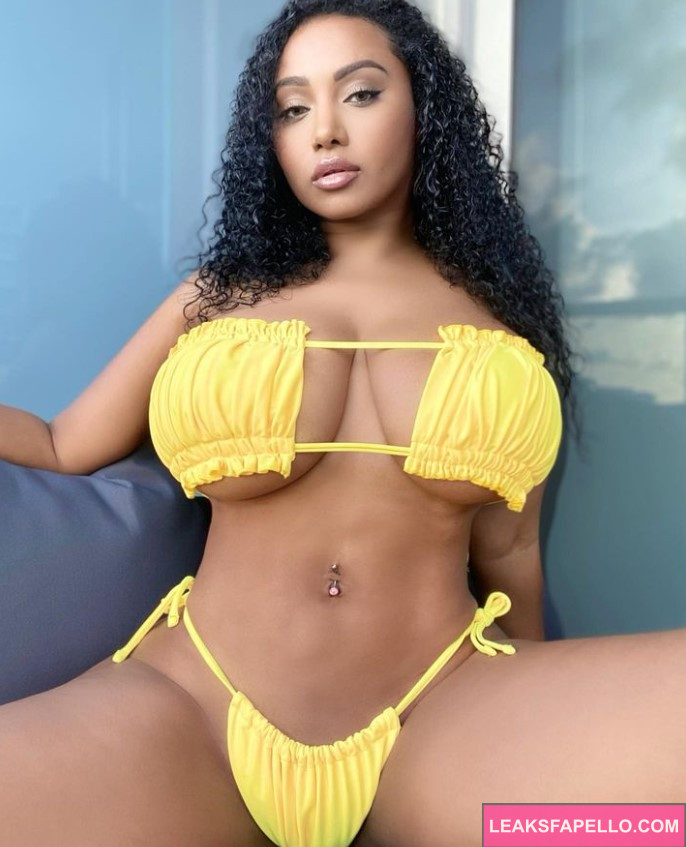 British Olivia @britisholivia OnlyFans big tits thick ass only fans model wearing yellow two piece bikini