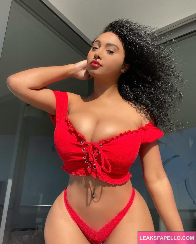 British Olivia @britisholivia OnlyFans big tits thick ass only fans model wearing red 