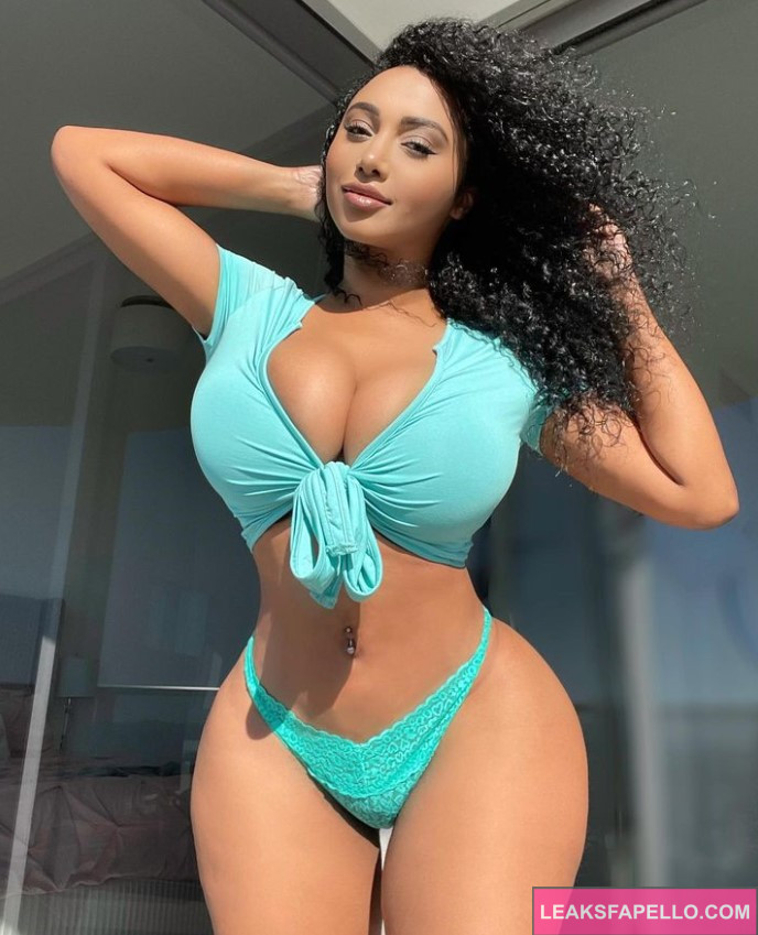 British Olivia @britisholivia OnlyFans big tits thick ass only fans model wearing neon blue top and underwear