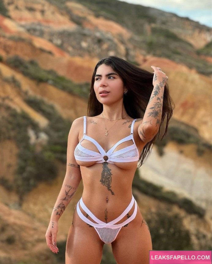 Jois Ramirez @joisramirezo OnlyFans hot big tits tatted only fans model wearing white two piece 