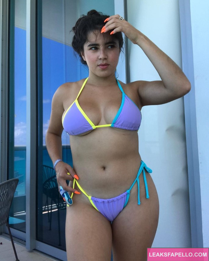 Holy Yoly @holyyoly OnlyFans hot thick ass big boobs only fans model wearing purple two piece bikini