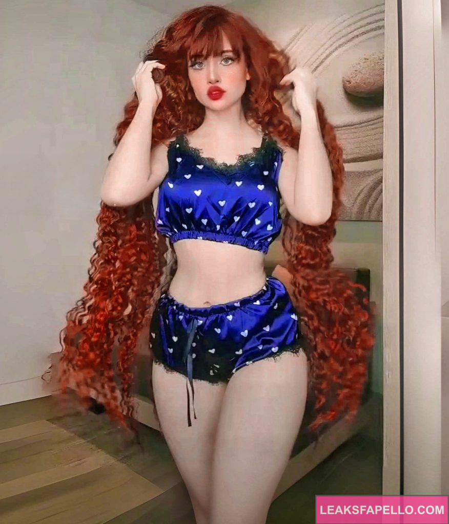 Bella Dueñas @belladuenas OnlyFans redhead big tits sexy tall only fans model wearing blue top and shorts 