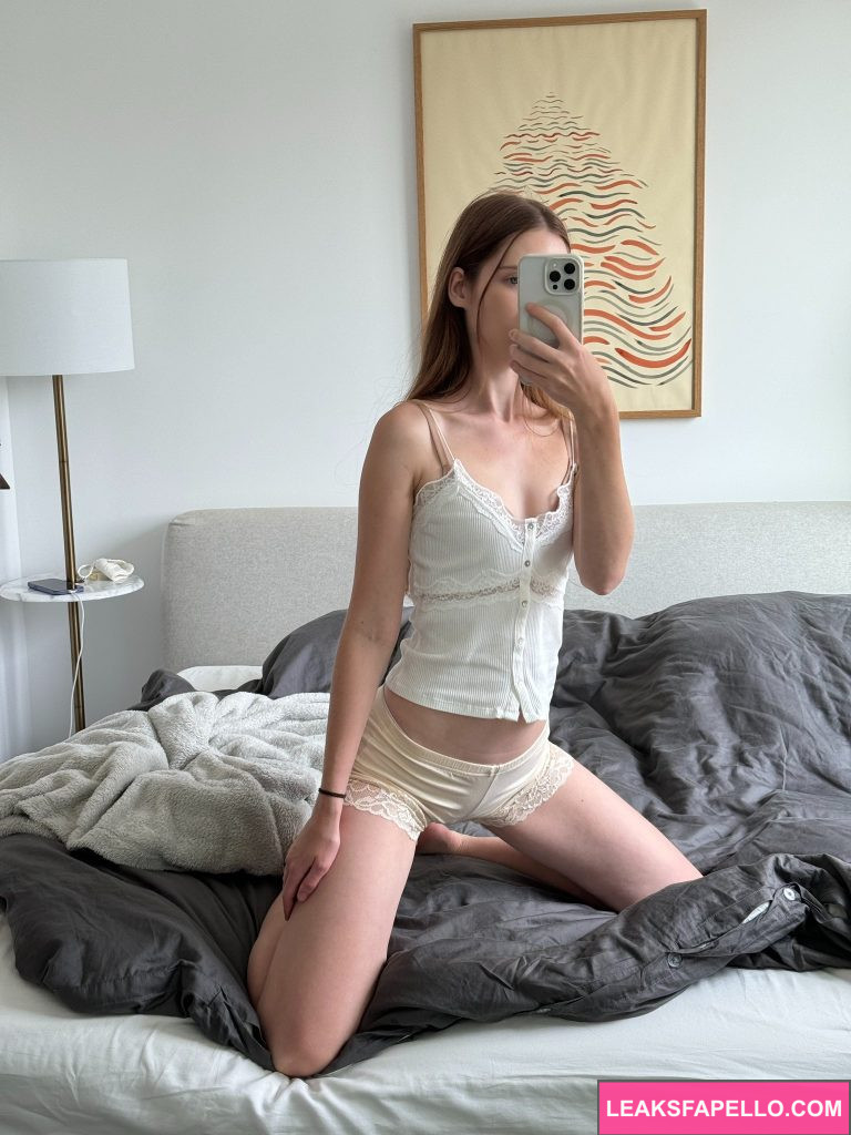 Eireen @eireenskinnygirl OnlyFans petite sexy hot only fans model wearing white shorts and tops on the bed