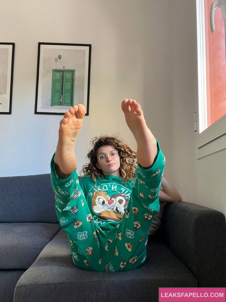 Venere Battisti @battistivenere OnlyFans petite only fans model wearing green pajamas on the couch