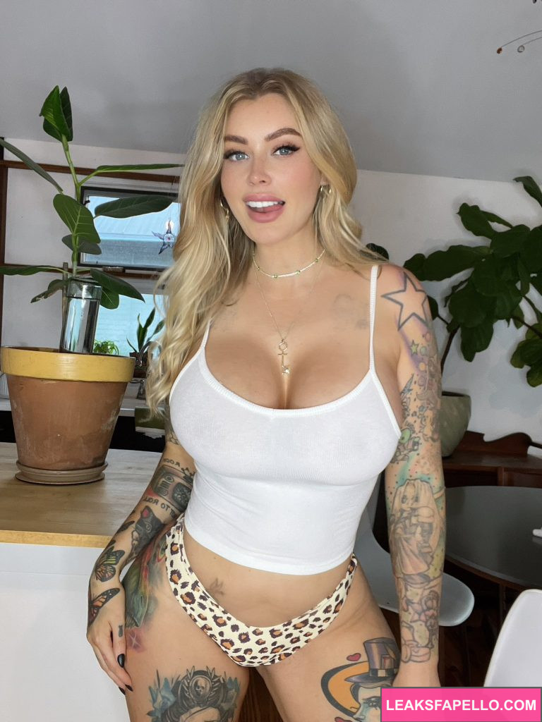 Laura Lux @lauralux OnlyFans MILF blonde big tits only fans model wearing white top 