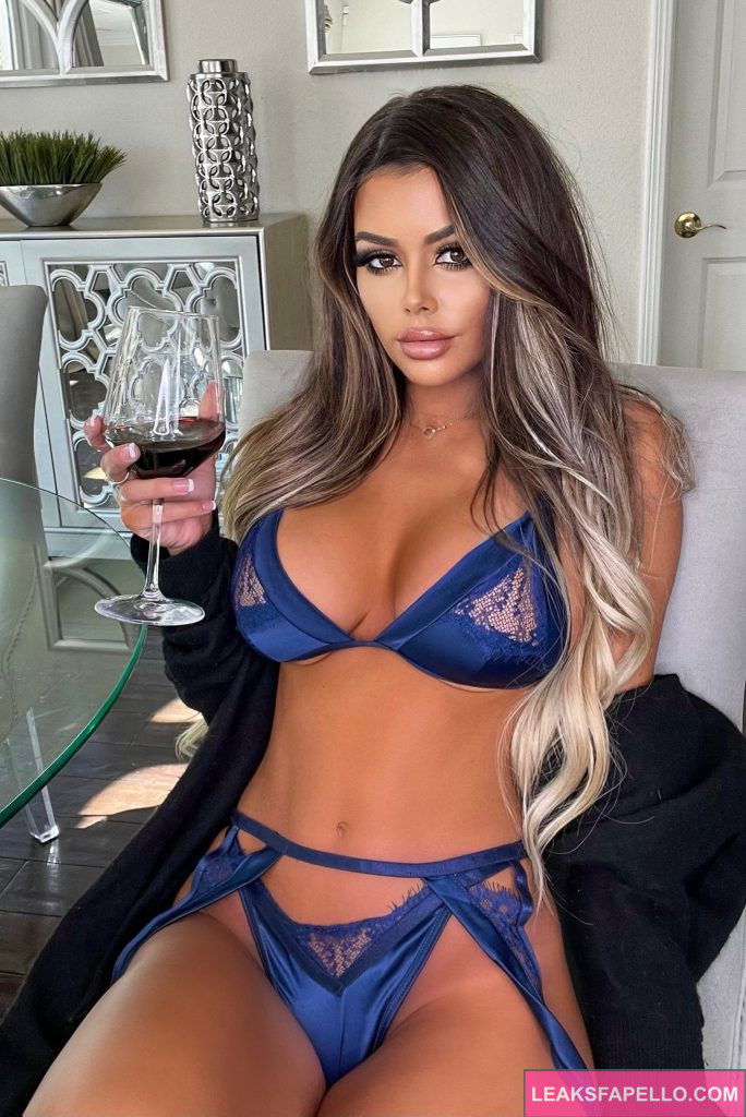 Julianne Kissinger @juliannee OnlyFans hot only fans big tits sexy model wearing blue two piece lingerie holding a wine