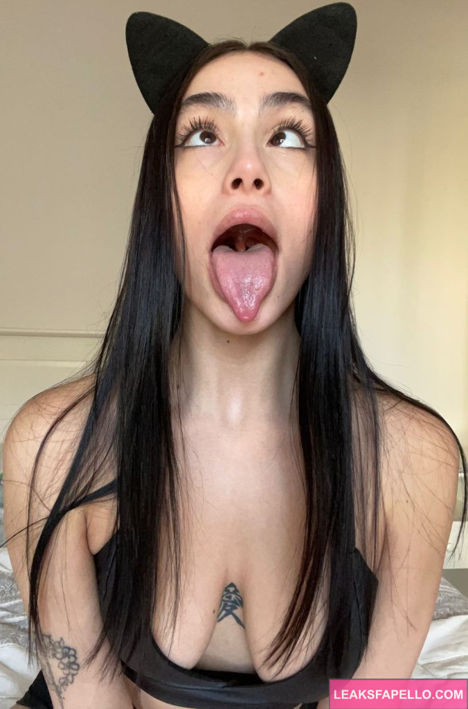 Lily Rose @lilyrose.vibes OnlyFans big tits sexy hot only fans model wearing black cat ears and top with her tounge out