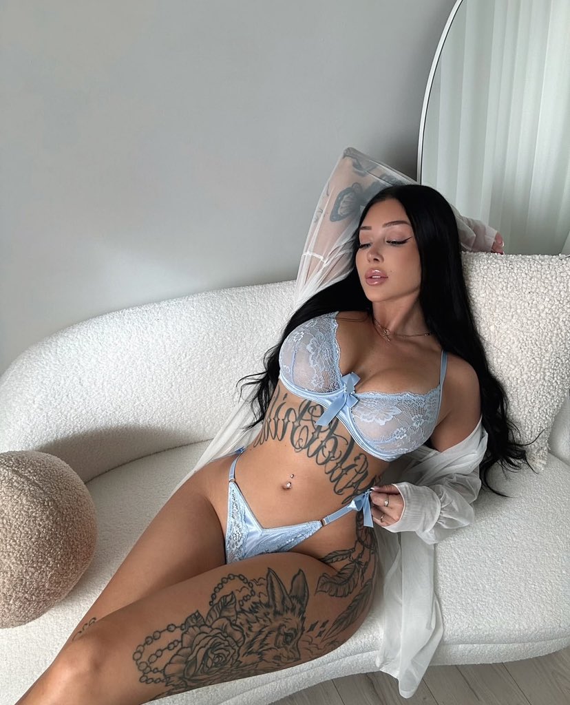 Valerie Cossette @valeriec OnlyFans hot tatted big tits fit only fans model wearing blue two piece lingerie on the couch