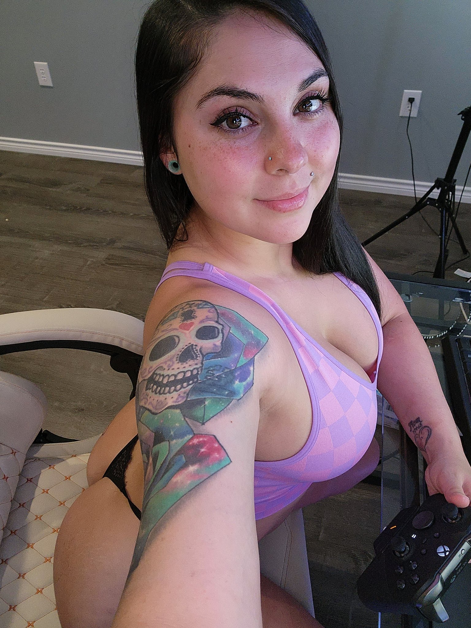 Brooke Synn @notbrookesynn OnlyFans big tits thick ass only fans model wearing  purple top and black underwear sitting on her gaming chair selfie