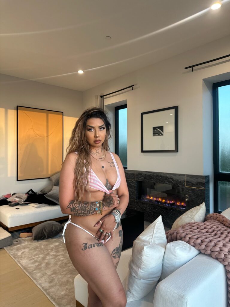 Ally Lotti @povlotti OnlyFans big tits sexy only fans model wearing pink two piece bikini