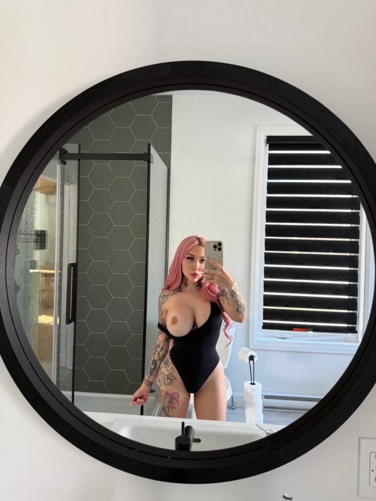 Jade Lavoie @misslavoie OnlyFans big tits thick only fans model wearing black one piece bikini mirror shot with one of her tits out