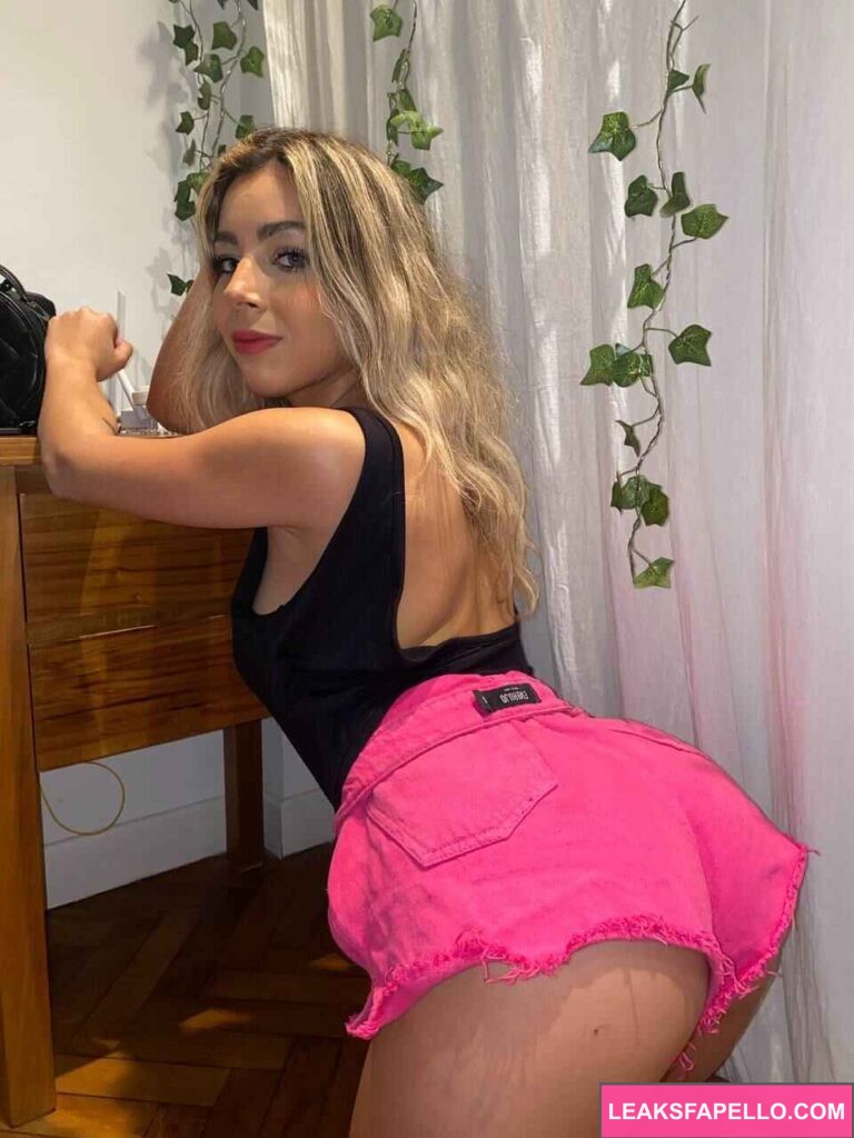 Chloe Monroe @itschloe.monroe OnlyFans model wearing black top and pink shorts