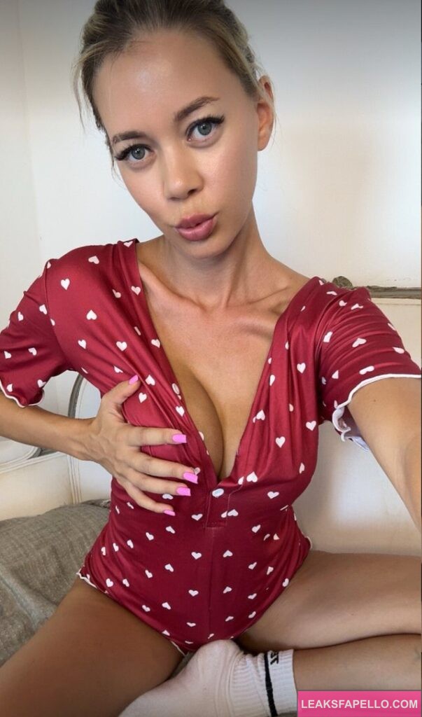 Sofie Mills @sofie_mills OnlyFans blonde sexy model wearing red holding her boobs