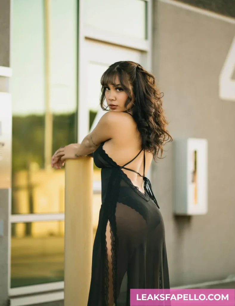 Yumi Sin wearing black see-through dress