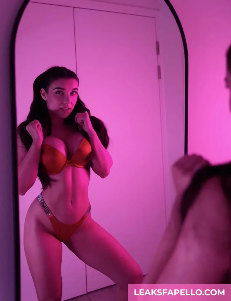 Daisy Drew wearing red lingerie, mirror selfie