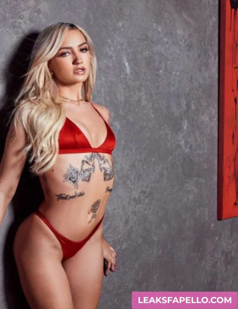 Mia Molotov, Curvy Blonde Big Tits Tattooed OnlyFans model, wearing red lingerie