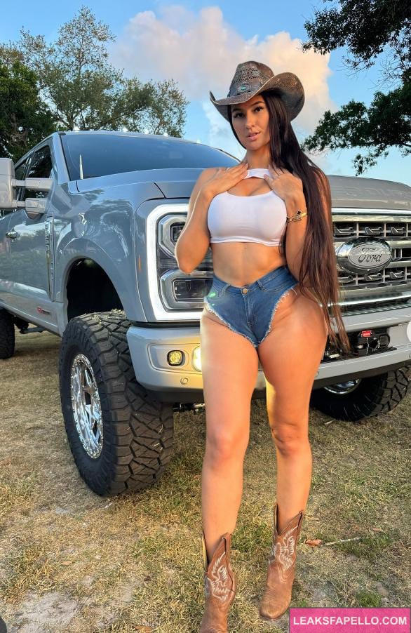 Marie Temera standing in front of a Truck