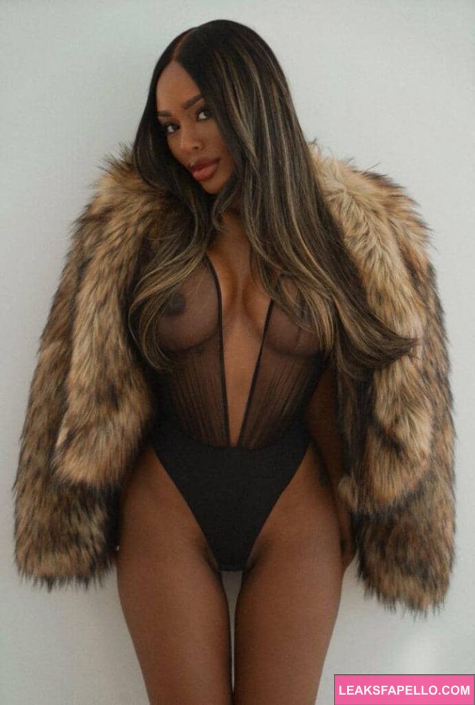 Aubree Rene posing for a pic wearing a fur coat