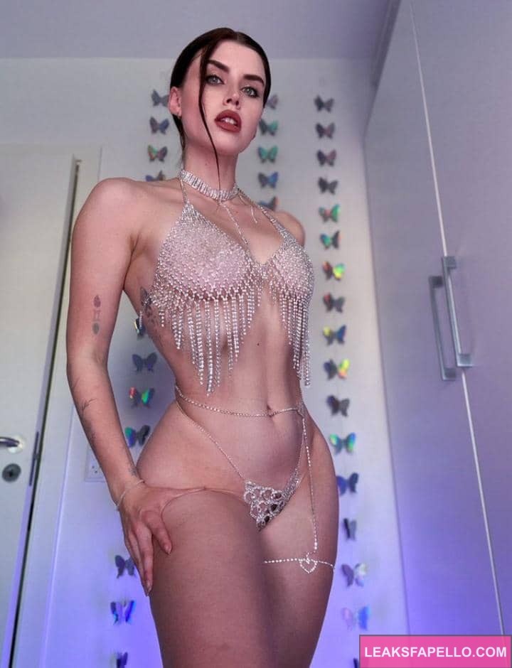 Adeline Frost in a sexy lingerie revealing her sexy body