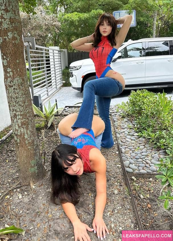 Tayler Hills in a tight cosplay spiderman costume with a model