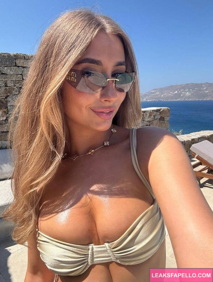 Lily Phillips with glasses on