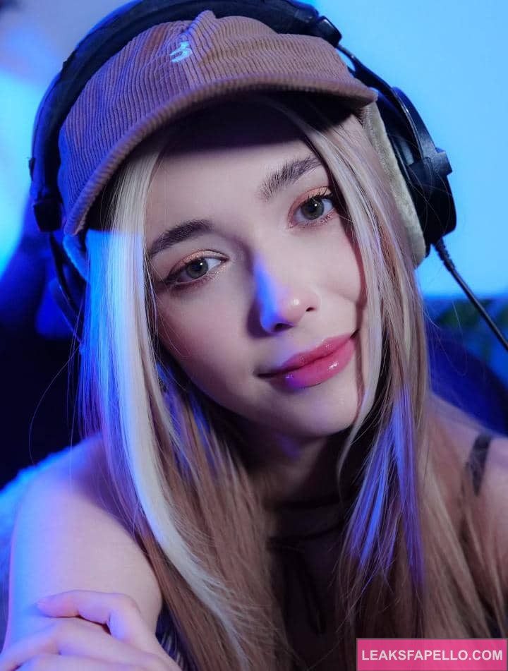 Mila Azul wearing a headset