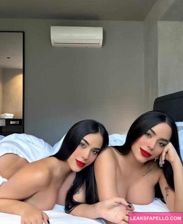 Gemelas Abello naked o the bed showing off her cleavages