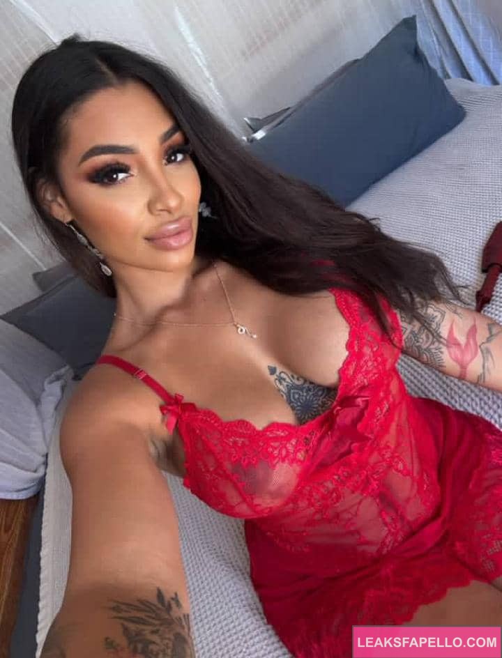 Erotic Medusa showing off her cleavages in a sexy nightie dress