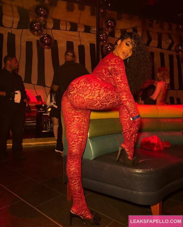 Erotic Medusa posing in a sexy net in public