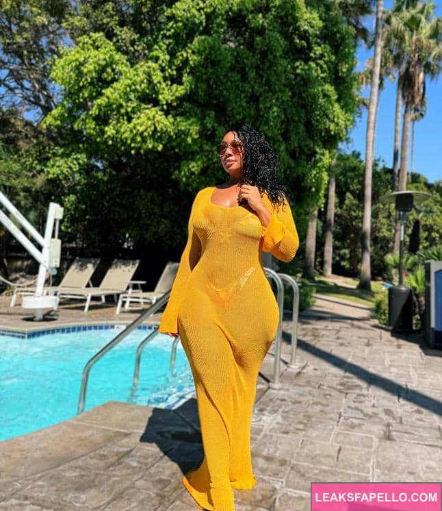 Candy Mary besides a pool