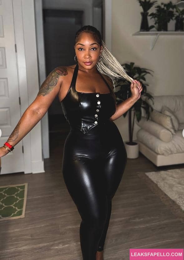 Candy Mary in a black sexy latex jumpsuit