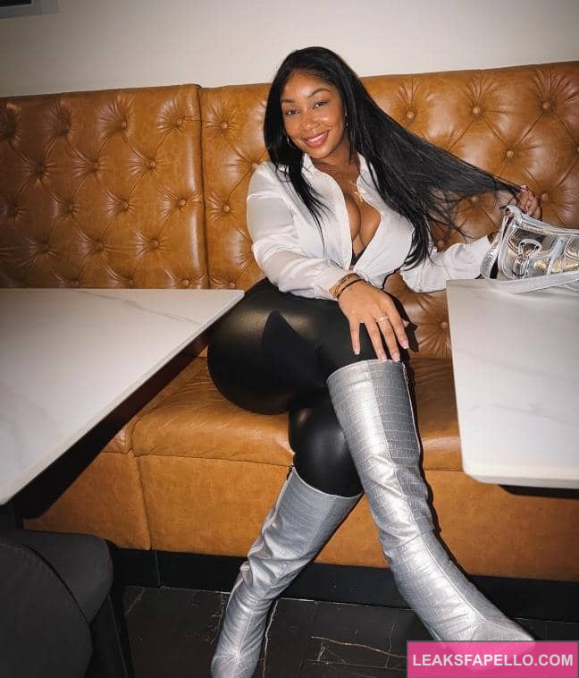 Candy Mary crossing her legs in a sexy way