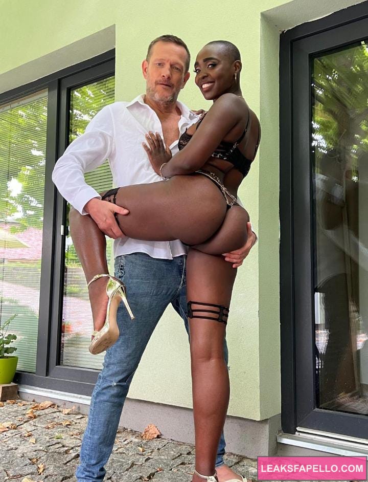 Zaawaadi and a male model holding her ass cheeks